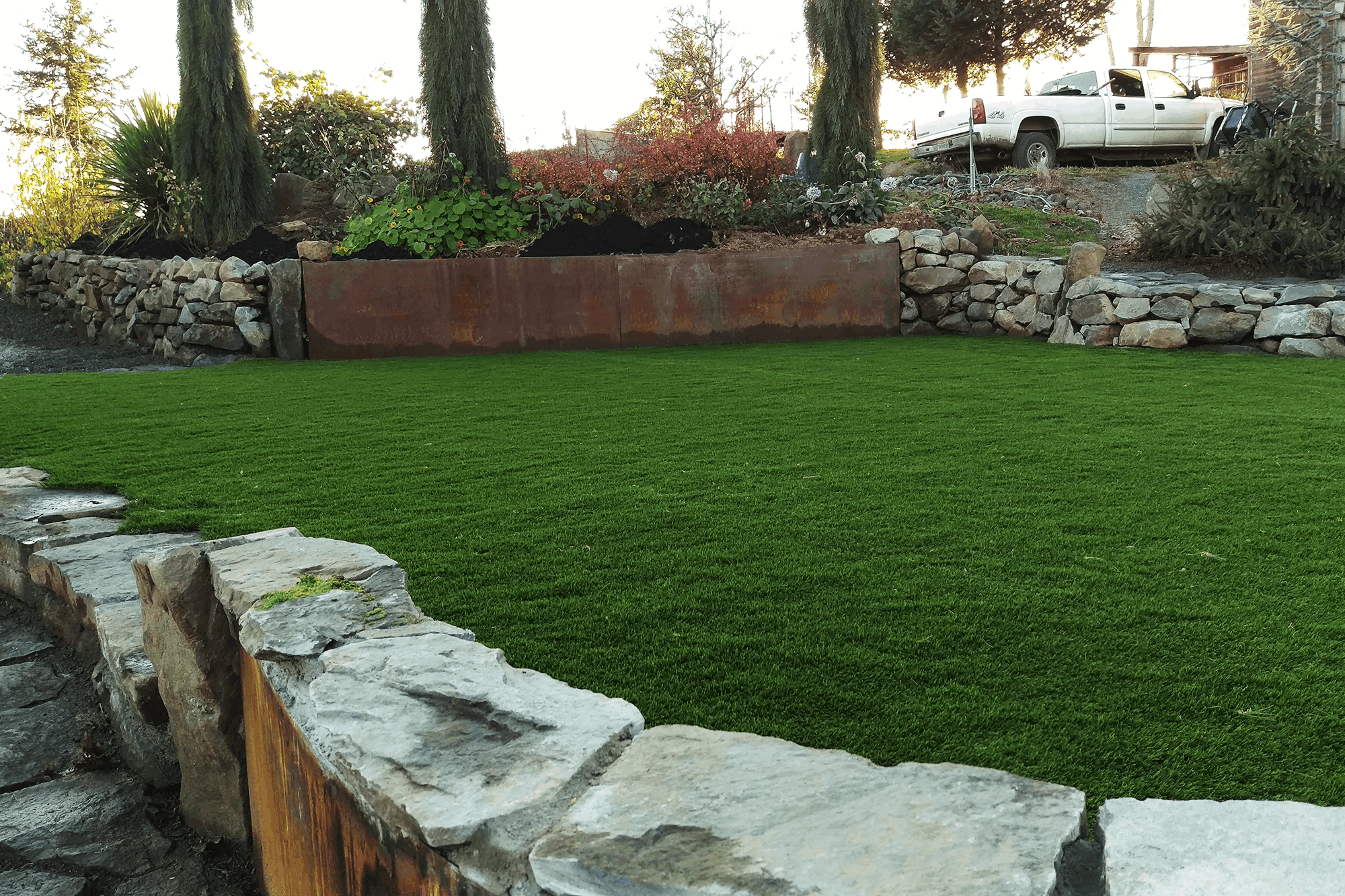 Synthetic grass creates a beautiful, green eco-friendly look.